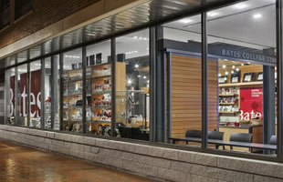 High performance storefront and curtainwall, ACM panel, and windows with custom extrusions.