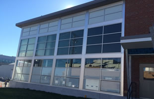 USM Heat Plant. Portland, Maine: Storefront, metal panels, decorative glass.